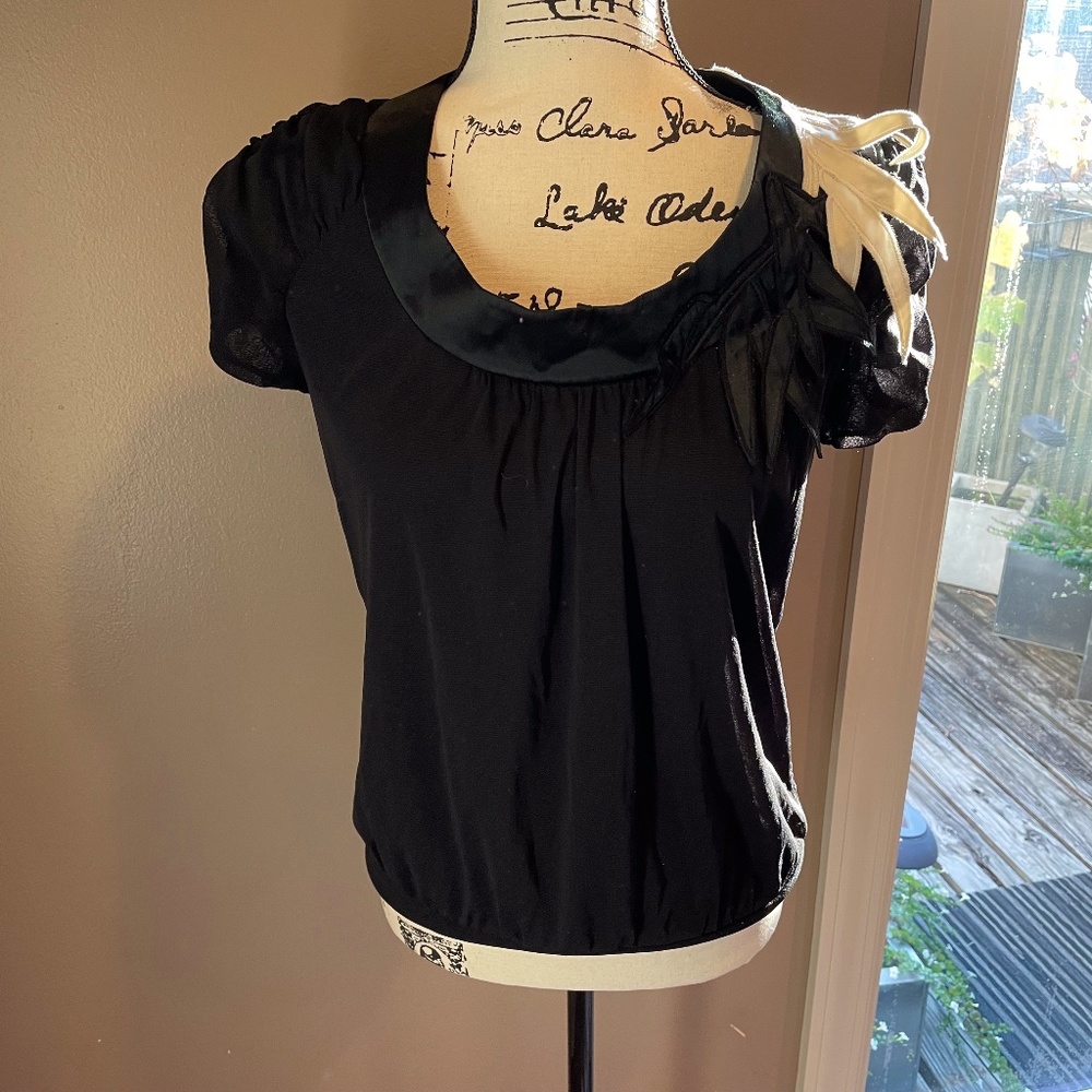 Cap sleeve top with petals on one shoulder